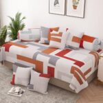 Story@Home Diwan Set Microfiber 8 Pc Set For Living Room- 1 Single Size Bedsheet, 5 Cushion Covers And 2 Bolster Covers, Red & Brown, Geometric