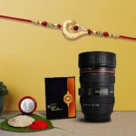 Oblivion Multicolor (K1_258_M720) Rakhi Combo With Camera Lens Coffee Mug, Silver Color Pooja Coin & Greeting Card | Occasion | Rakhi For Brother With Gift | Rakhi Mug Brother | Rakhi Combo For Brother | Fancy Rakhi For Brother | Tea Mug | Men Fancy Rakhi | Set Of 1 |