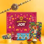 11 Items | Share The Joy Gift Box | Single Rakhi | By Go Desi | Coconut Laddu | Desi Popz: Tangy Imli, Real Aam, Kaccha Aam | Meetha Paan | Roli Chawal Set | Rakhi For Brother | Gifts For Raksha Bandhan | Raksha Bandhan Gift Hamper