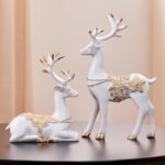Amazon Basics Creative Resin Golden and White Reindeer Sculptures | Beautiful Home Decor Handicraft Resin | Elevates The Energy of Your Room (Pack of 2, White and Golden)
