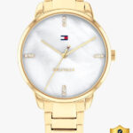 TOMMY HILFIGER Paige Tommy Hilfiger White MOP Dial Gold Stainless Steel Strap Analog Watch  – For Women